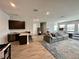 Spacious game room with a pool table, seating area, and bar at 811 Manns Harbor Dr, Apollo Beach, FL 33572