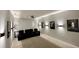 Dedicated home theater with comfortable seating and movie posters at 811 Manns Harbor Dr, Apollo Beach, FL 33572