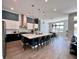Modern kitchen with blue island and stainless steel appliances at 811 Manns Harbor Dr, Apollo Beach, FL 33572