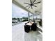 Covered patio with seating area and water views at 811 Manns Harbor Dr, Apollo Beach, FL 33572