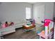 Bright playroom featuring a sectional sofa and ' toys at 811 Manns Harbor Dr, Apollo Beach, FL 33572