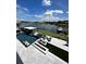 Luxury pool and patio overlooking the water, with fire pit and outdoor kitchen at 811 Manns Harbor Dr, Apollo Beach, FL 33572