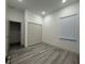 This bright bedroom features a closet, a window and recessed lighting at 135 Sunset Rd, Rotonda West, FL 33947