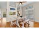 Bright dining room with a farmhouse table and bench seating at 505 Sally Lee Dr, Ellenton, FL 34222