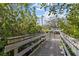 Wooden dock providing access to the waterway at 505 Sally Lee Dr, Ellenton, FL 34222