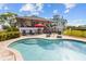 Stunning pool area with lounge chairs and patio furniture at 505 Sally Lee Dr, Ellenton, FL 34222