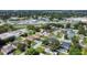 Aerial view of neighborhood, homes and landscape at 8115 61St N St, Pinellas Park, FL 33781