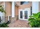 Front entrance with double doors and stone accents at 8115 61St N St, Pinellas Park, FL 33781