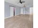 Living area with sliding barn door to laundry room at 8115 61St N St, Pinellas Park, FL 33781