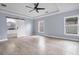Spacious main bedroom with tile floors and barn door at 8115 61St N St, Pinellas Park, FL 33781
