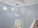 Modern staircase with open railing and unique lighting at 8115 61St N St, Pinellas Park, FL 33781