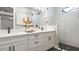 Modern bathroom with double vanity and a large walk-in shower at 14370 Hammock Oak St, Parrish, FL 34219