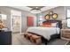 Spacious bedroom with en-suite bathroom and stylish decor at 14370 Hammock Oak St, Parrish, FL 34219
