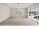 Bright bedroom with large windows overlooking pool at 15392 Taurus Cir, Port Charlotte, FL 33981