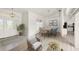 Bright dining room with a table for six and view to kitchen at 15392 Taurus Cir, Port Charlotte, FL 33981