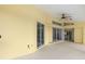 Covered patio with sliding glass doors leading to interior at 15392 Taurus Cir, Port Charlotte, FL 33981