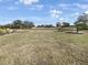 Large backyard with partial view of golf course at 2092 Nuremberg Blvd, Punta Gorda, FL 33983