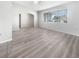 Bright living room featuring light gray vinyl flooring at 2092 Nuremberg Blvd, Punta Gorda, FL 33983