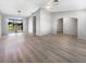 Open concept living room and dining area with vinyl flooring at 2092 Nuremberg Blvd, Punta Gorda, FL 33983