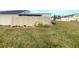 Private backyard with fenced enclosure and grassy area at 2587 Forest Run Ct # 141B, Clearwater, FL 33761