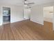 Spacious bedroom featuring hardwood floors and ample natural light at 2587 Forest Run Ct # 141B, Clearwater, FL 33761