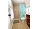Bathroom with shower, toilet and sink at 1420 Bayshore Blvd # 316, Dunedin, FL 34698