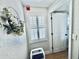 Small hallway with white shutters and an AC unit at 1420 Bayshore Blvd # 316, Dunedin, FL 34698