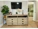 Living room with media console and flat-screen TV at 1420 Bayshore Blvd # 316, Dunedin, FL 34698