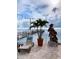 Relaxing patio overlooking the water with lounge chair at 1420 Bayshore Blvd # 316, Dunedin, FL 34698