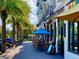 Outdoor seating area in front of shops and restaurants at 1420 Bayshore Blvd # 316, Dunedin, FL 34698