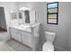 Bathroom with double vanity, tiled floor, and a toilet at 6826 San Jose Loop, New Port Richey, FL 34655