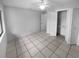 Bedroom with tile floor and double closet at 6826 San Jose Loop, New Port Richey, FL 34655