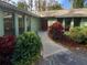 Inviting curb appeal with a landscaped yard and walkway at 6826 San Jose Loop, New Port Richey, FL 34655