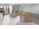 Modern kitchen with granite island and stainless steel appliances at 6826 San Jose Loop, New Port Richey, FL 34655