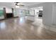 Spacious living room with hardwood floors and fireplace at 6826 San Jose Loop, New Port Richey, FL 34655