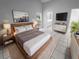 Spacious main bedroom with ensuite bathroom and wood floors at 6826 San Jose Loop, New Port Richey, FL 34655