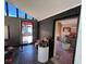 Entryway with view into kitchen and black brick wall at 16211 3Rd E St, Redington Beach, FL 33708