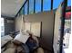 Living room with large windows and a pile of pillows at 16211 3Rd E St, Redington Beach, FL 33708