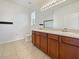 Bathroom with double vanity and a walk in shower at 3105 46Th E St, Palmetto, FL 34221