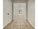 Bright hallway with tile flooring, leading to other rooms at 3105 46Th E St, Palmetto, FL 34221