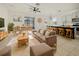 Bright living room features open floor plan with kitchen and dining area at 3105 46Th E St, Palmetto, FL 34221
