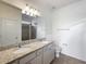 Bathroom boasts double sinks, granite countertops and a walk-in shower at 1403 Custer Bayou St, Ruskin, FL 33570