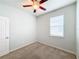 Cozy bedroom with ceiling fan and neutral walls at 1403 Custer Bayou St, Ruskin, FL 33570