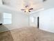 Large bedroom with ceiling fan and carpet flooring at 1403 Custer Bayou St, Ruskin, FL 33570