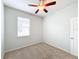 Bright bedroom with ceiling fan and window coverings at 1403 Custer Bayou St, Ruskin, FL 33570