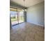 Bright dining area with sliding glass doors leading to the patio at 1403 Custer Bayou St, Ruskin, FL 33570