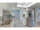 Updated kitchen with stainless steel appliances and granite countertops at 2246 Goldenrod St, Sarasota, FL 34239