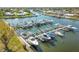 Aerial view of community with many boats and docks at 72 Windsor Dr, Englewood, FL 34223