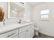 Clean bathroom, featuring a white vanity and marble shower at 72 Windsor Dr, Englewood, FL 34223