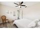 Cozy bedroom with full-size bed and wood-look floors at 72 Windsor Dr, Englewood, FL 34223